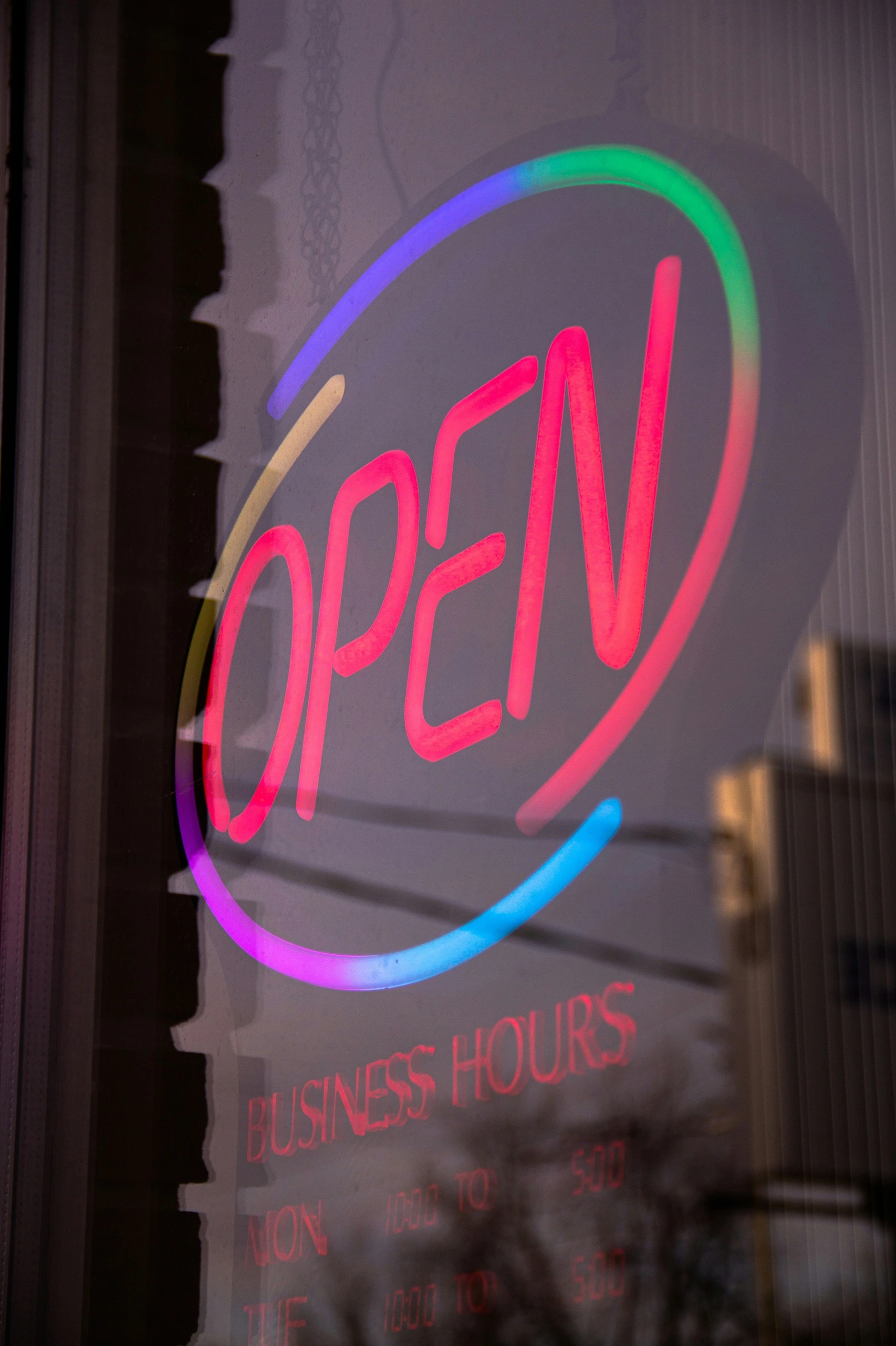 OPEN sign displayed in a window