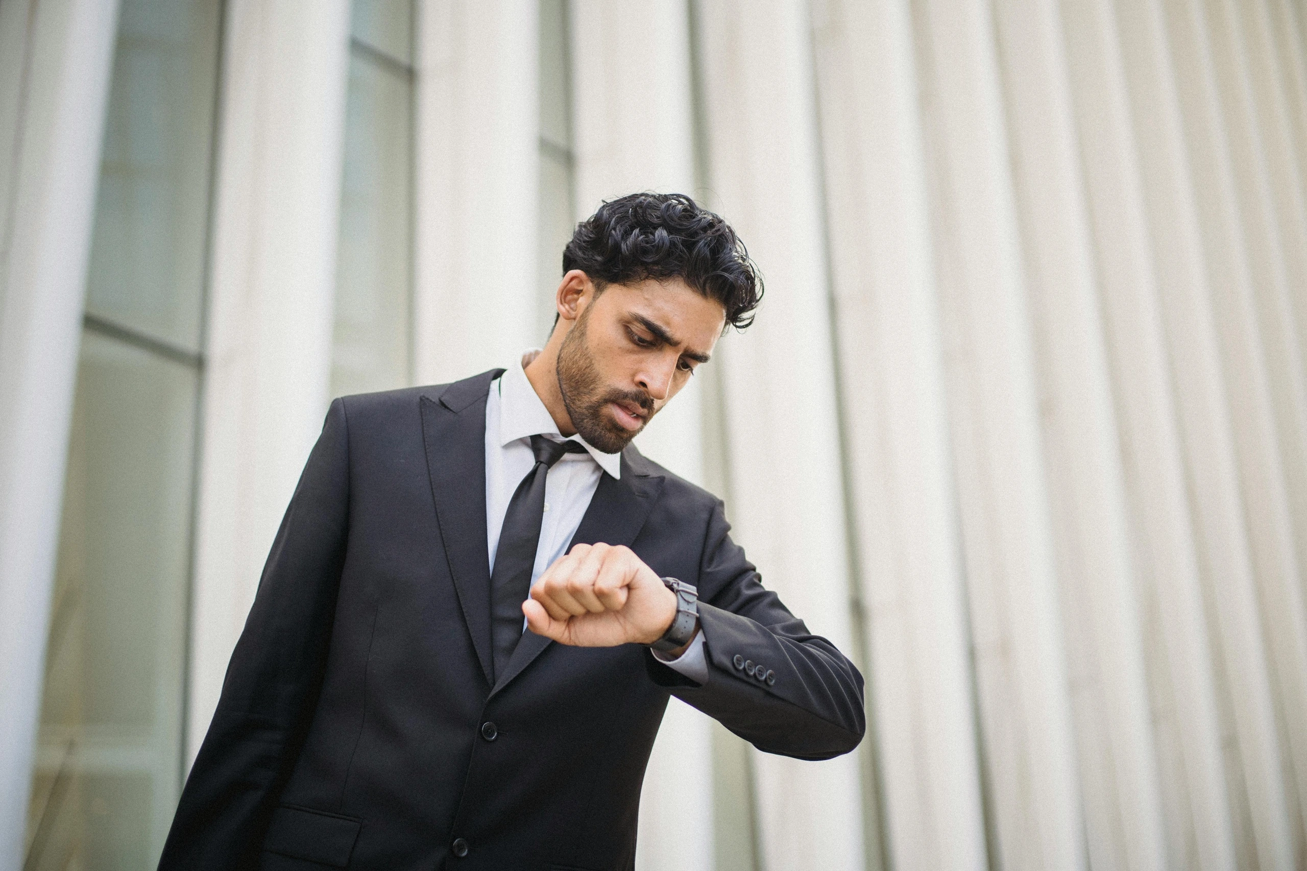 Man looking at his watch
